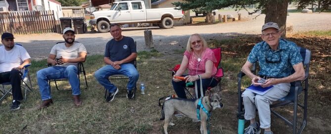 Dan Hunt with residents of Mini Mansions MHP in Bayfield